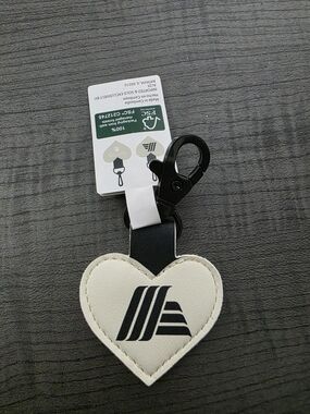 Aldi White Heart Quarter Holder Keychain with Black Logo and Clip